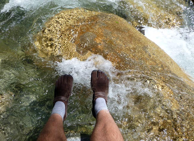 Gorlla feet over the river